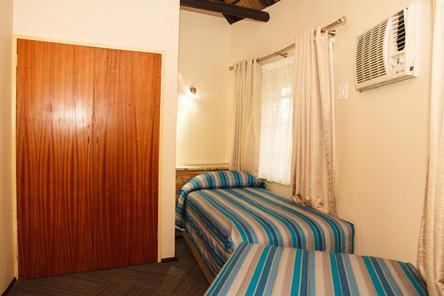 Badplaas, A Forever Resort: 4-Sleeper Rondavel. 2 bedrooms (1 double & 2 single rooms)