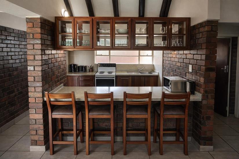 Badplaas, A Forever Resort: 4-Sleeper Chalet. 2 bedrooms (1 double bed & 2 single beds)